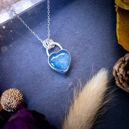 Bold and beautiful, blue aquamarine crystal heart pendant necklace. This pendant has been handcrafted out of fine and sterling silver. The piece is minimal yet unique. Suitable for jewellery gifts. Gothic, hippy and ideal for her. March birthstone