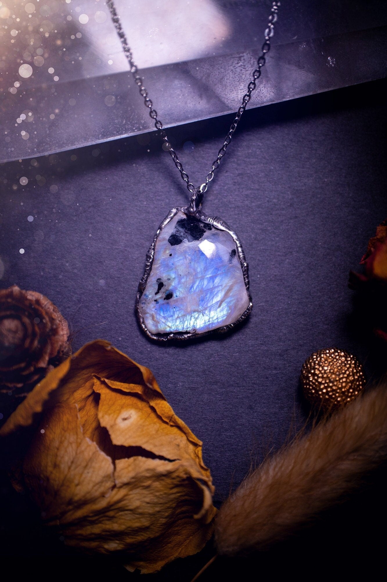 Handcrafted and beautiful rainbow moonstone crystal pendant necklace. This necklace has been made using the soft solder method also known as the tiffany technique. Moonstone is the birthstone for June. Ideal birthday gift, gothic and witch jewellery