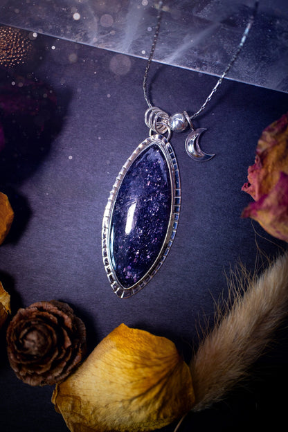 Handcrafted, beautiful, Iolite Sunstone crystal pendant necklace. Featuring a gorgeous sparkly Iolite gemstone, and made from recycled sterling silver. Accompanied by a little moon charm. Ideal gift for crystal and jewellery lovers. Hippy and Gothic