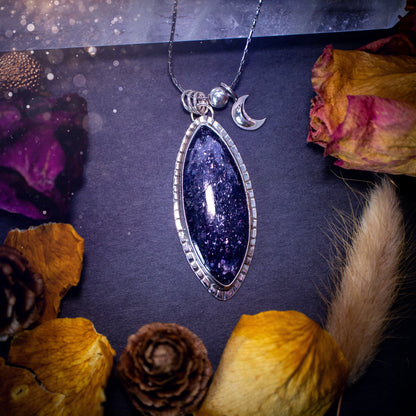 Handcrafted, beautiful, Iolite Sunstone crystal pendant necklace. Featuring a gorgeous sparkly Iolite gemstone, and made from recycled sterling silver. Accompanied by a little moon charm. Ideal gift for crystal and jewellery lovers. Hippy and Gothic