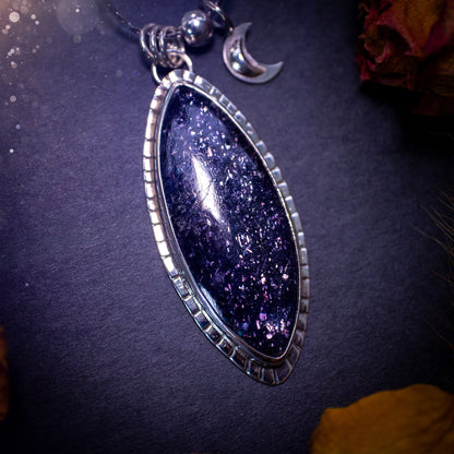 Handcrafted, beautiful, Iolite Sunstone crystal pendant necklace. Featuring a gorgeous sparkly Iolite gemstone, and made from recycled sterling silver. Accompanied by a little moon charm. Ideal gift for crystal and jewellery lovers. Hippy and Gothic