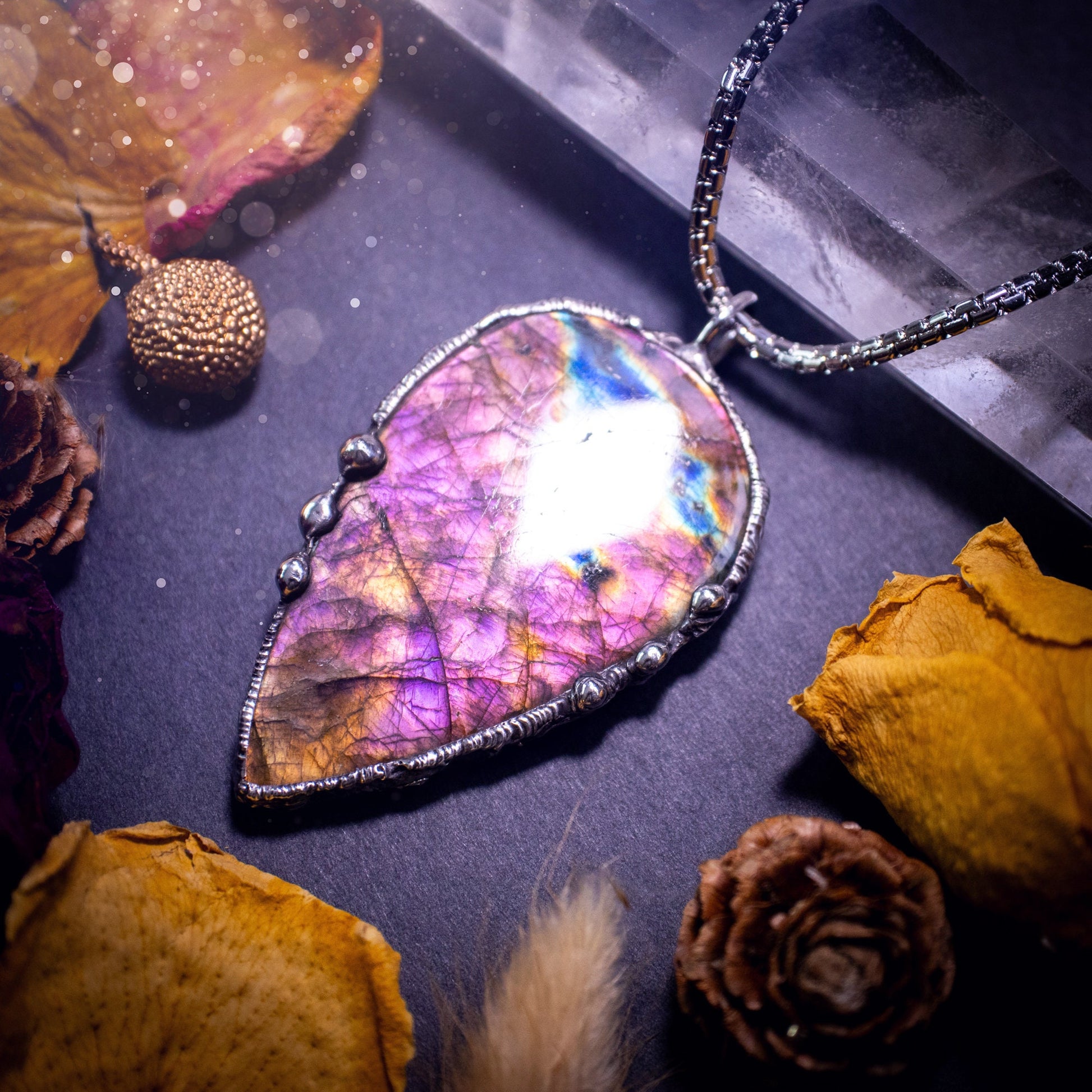 Large, beautiful purple and pink labradorite, soft soldered pendant necklace. This pendant has been made using the tiffany technique with lead free solder that contains silver. Featuring the most beautiful rainbow crystal. Gothic Jewellery. witchy