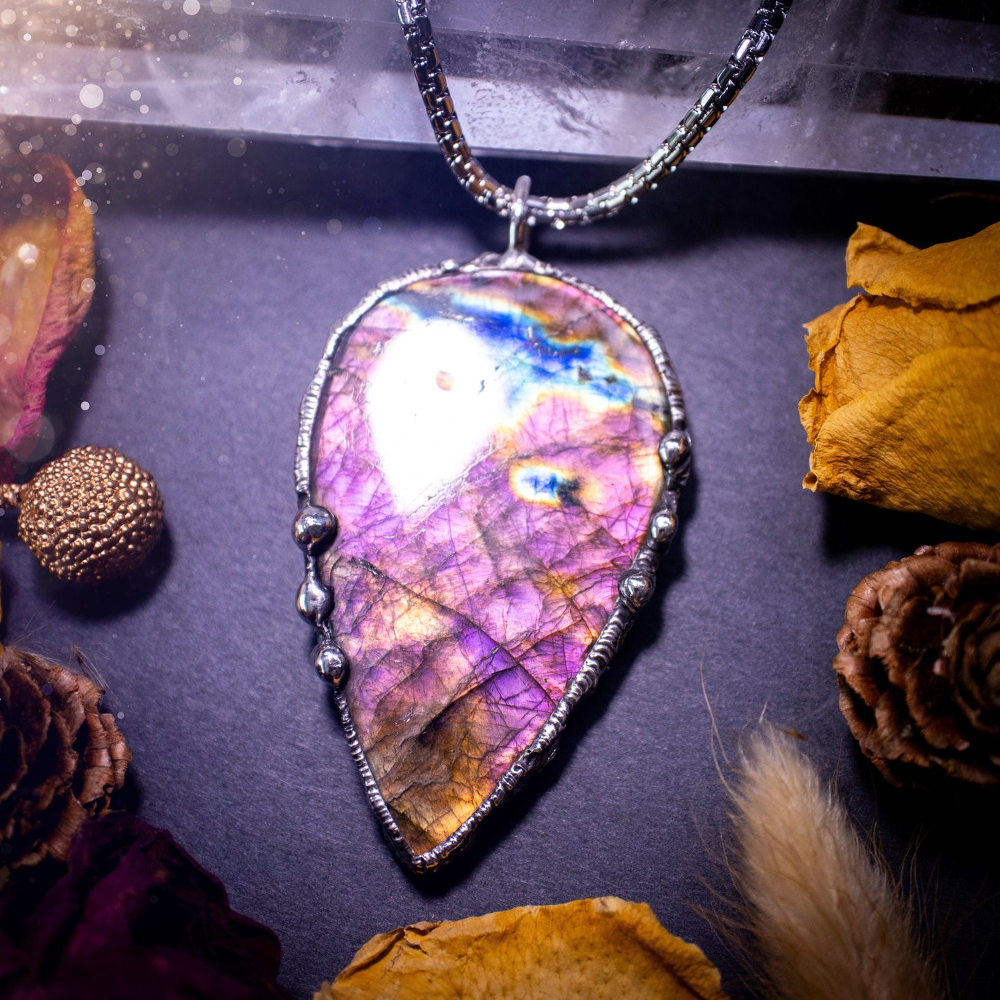 Large, beautiful purple and pink labradorite, soft soldered pendant necklace. This pendant has been made using the tiffany technique with lead free solder that contains silver. Featuring the most beautiful rainbow crystal. Gothic Jewellery. witchy