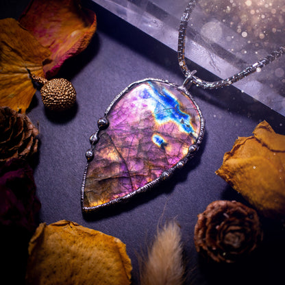 Large, beautiful purple and pink labradorite, soft soldered pendant necklace. This pendant has been made using the tiffany technique with lead free solder that contains silver. Featuring the most beautiful rainbow crystal. Gothic Jewellery. witchy