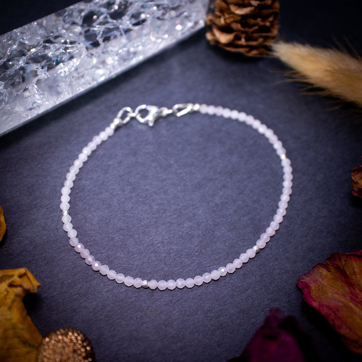 Calming, rose quartz stacking Bracelet. This bracelet has been made using the finest opals which are full of beautiful colours and sparkles. Strung on durable yet flexible 49 strand beading wire which gives a beautiful drape on the wrist.