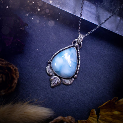 Unique and handmade, larimar pendant necklace. This Pendant has been made from recycled sterling silver and features scallop and leaf accents. The larimar is A grade quality and would make the ideal gift for jewellery and crystal lovers.