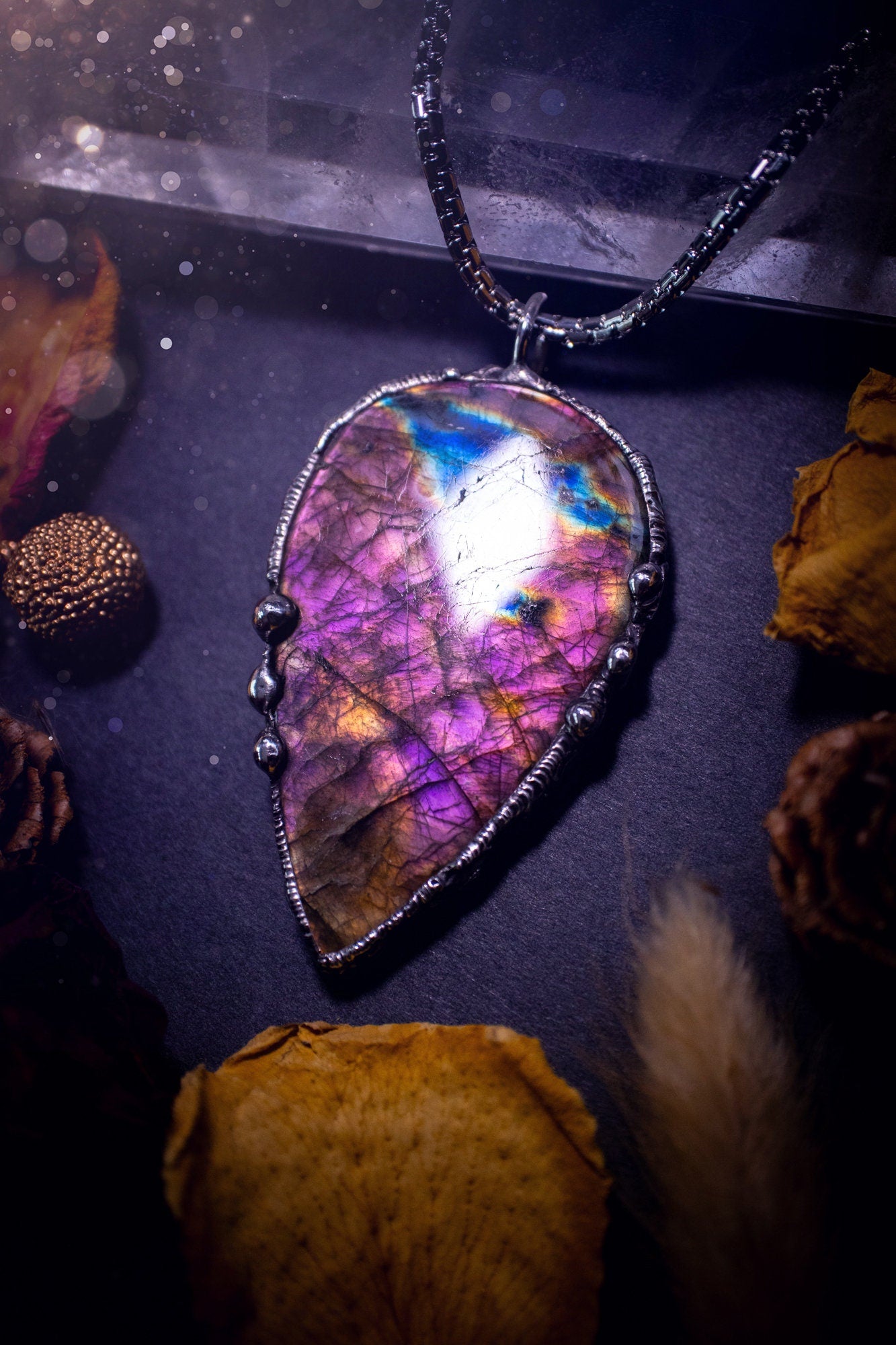 Large, beautiful purple and pink labradorite, soft soldered pendant necklace. This pendant has been made using the tiffany technique with lead free solder that contains silver. Featuring the most beautiful rainbow crystal. Gothic Jewellery. witchy