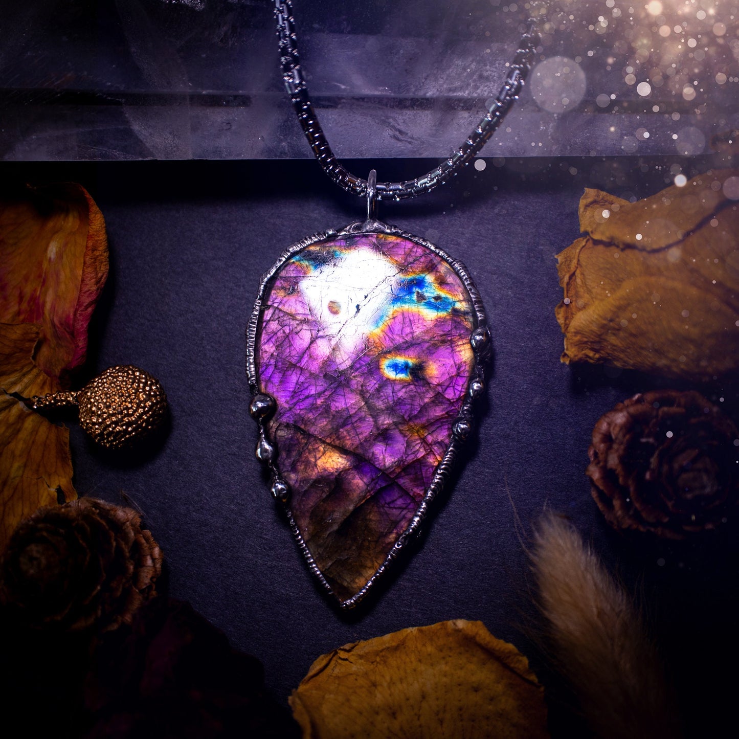 Large, beautiful purple and pink labradorite, soft soldered pendant necklace. This pendant has been made using the tiffany technique with lead free solder that contains silver. Featuring the most beautiful rainbow crystal. Gothic Jewellery. witchy