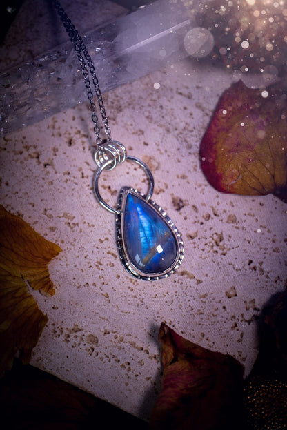 Stunning and handcrafted, Rainbow moonstone. This one of a kind pendant has been made using recycled sterling silver and fine silver, accompanied by a thick outer bezel that has been stamped to make it unique. Ideal gift for her and crystal lovers.