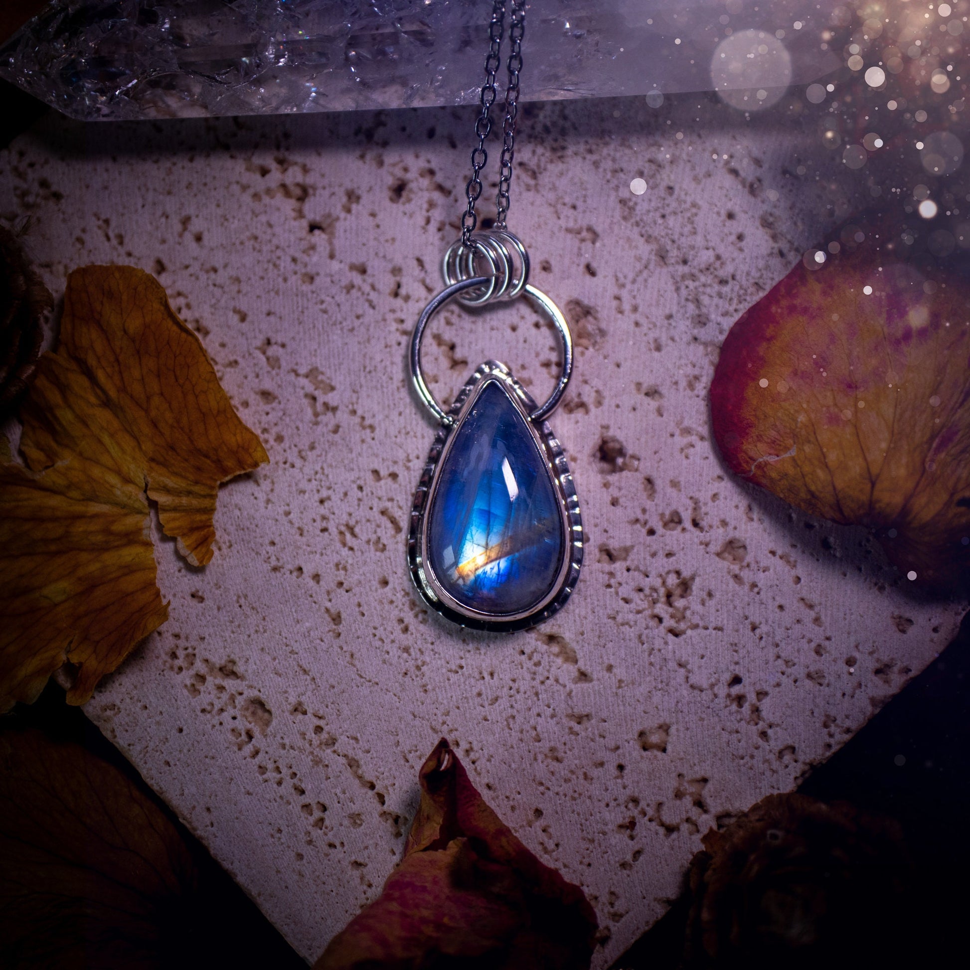 Stunning and handcrafted, very blue and flashy Rainbow moonstone. This one of a kind pendant has been made using recycled sterling silver and fine silver, accompanied by a thick outer bezel that has been stamped to make it unique. Ideal gift for her.