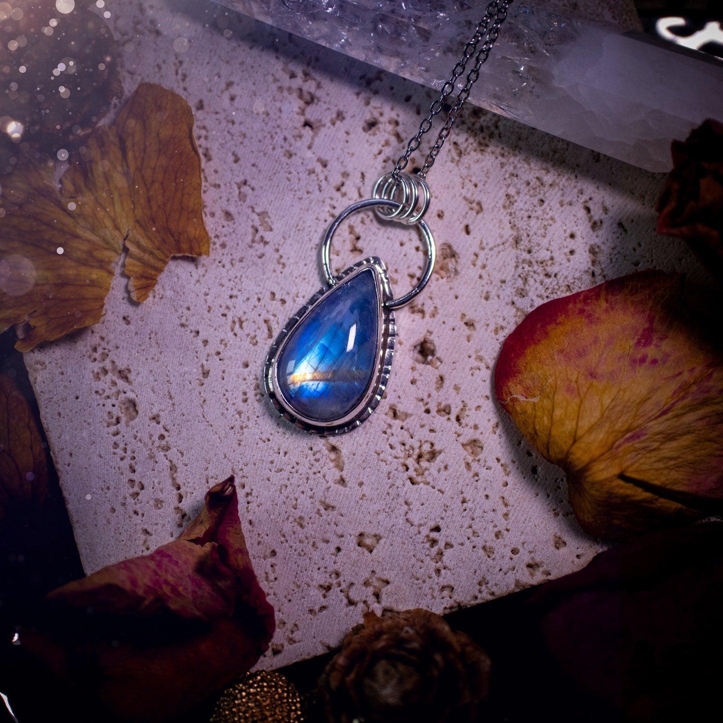 Stunning and handcrafted, very blue and flashy Rainbow moonstone. This one of a kind pendant has been made using recycled sterling silver and fine silver, accompanied by a thick outer bezel that has been stamped to make it unique. Ideal gift for her.