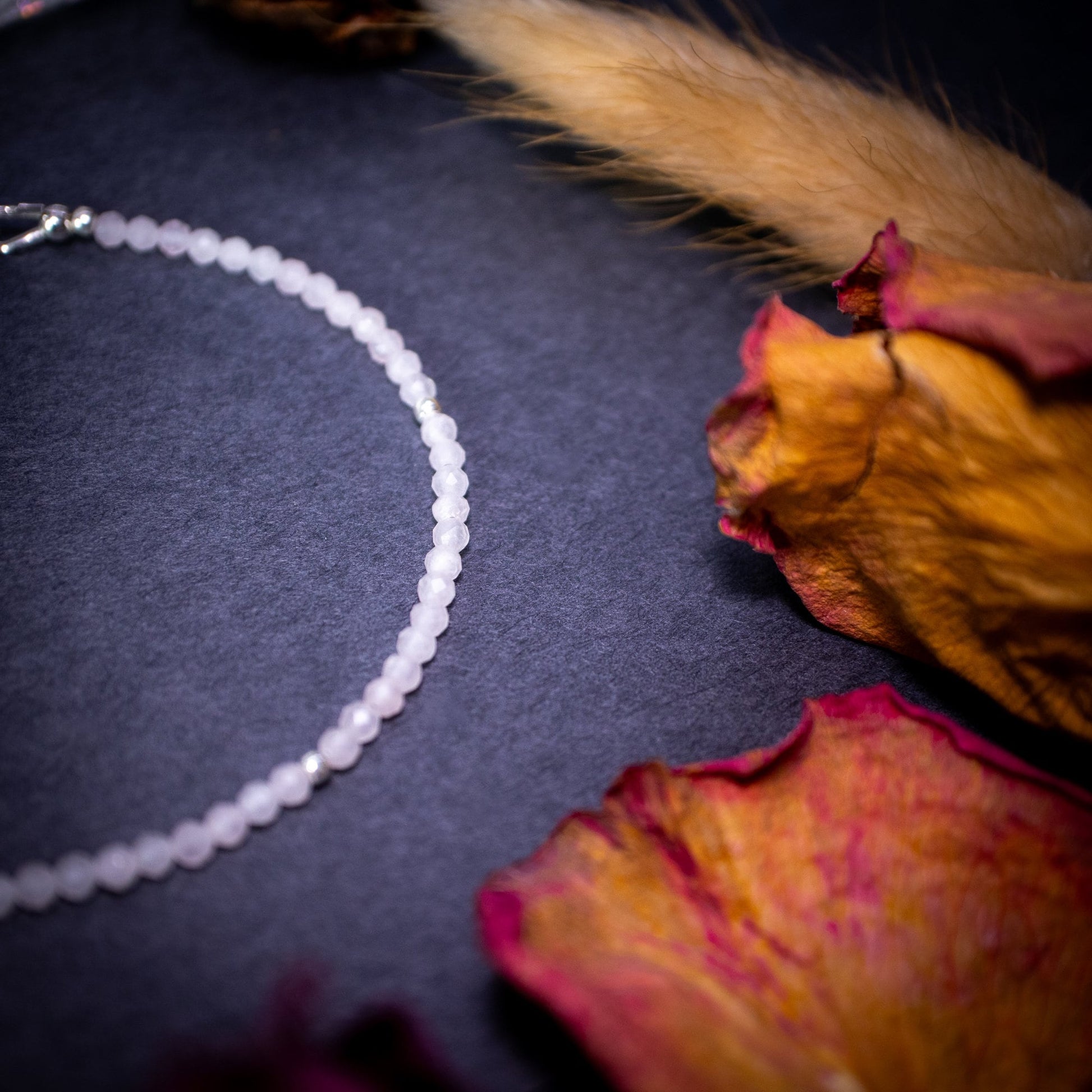 Calming, rose quartz stacking Bracelet. This bracelet has been made using the finest opals which are full of beautiful colours and sparkles. Strung on durable yet flexible 49 strand beading wire which gives a beautiful drape on the wrist.