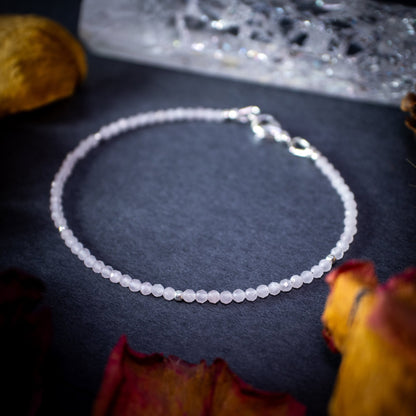 Calming, rose quartz stacking Bracelet. This bracelet has been made using the finest opals which are full of beautiful colours and sparkles. Strung on durable yet flexible 49 strand beading wire which gives a beautiful drape on the wrist.