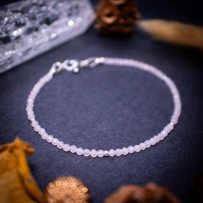 Calming, rose quartz stacking Bracelet. This bracelet has been made using the finest opals which are full of beautiful colours and sparkles. Strung on durable yet flexible 49 strand beading wire which gives a beautiful drape on the wrist.