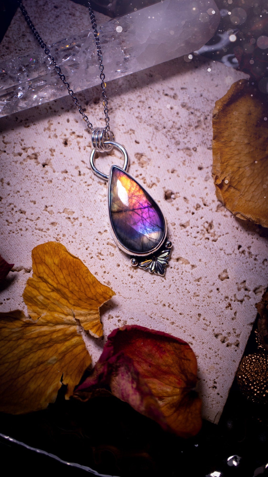 One of a kind and handcrafted, spectrolite labradorite pendant necklace. Featuring the most beautifully coloured crystal gemstone, full of rainbow colours. Handmade using recycled sterling silver complete with fan components. Healing jewellery, goth.