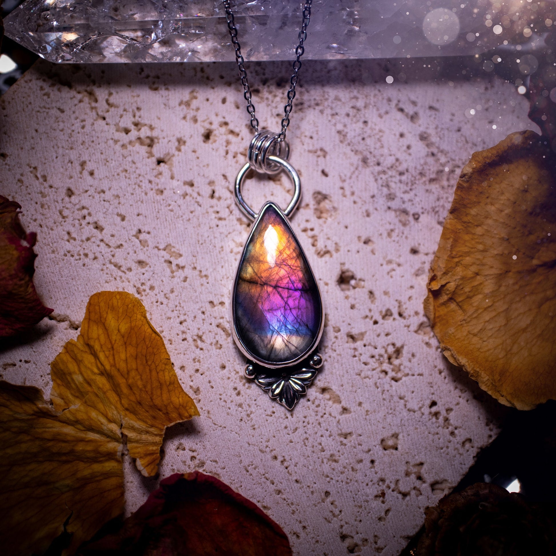 One of a kind and handcrafted, spectrolite labradorite pendant necklace. Featuring the most beautifully coloured crystal gemstone, full of rainbow colours. Handmade using recycled sterling silver complete with fan components. Healing jewellery, goth.