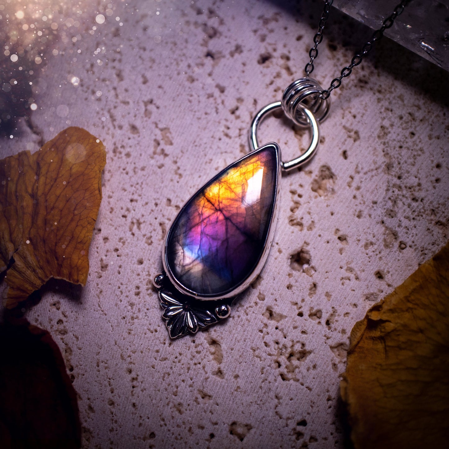 One of a kind and handcrafted, spectrolite labradorite pendant necklace. Featuring the most beautifully coloured crystal gemstone, full of rainbow colours. Handmade using recycled sterling silver complete with fan components. Healing jewellery, goth.