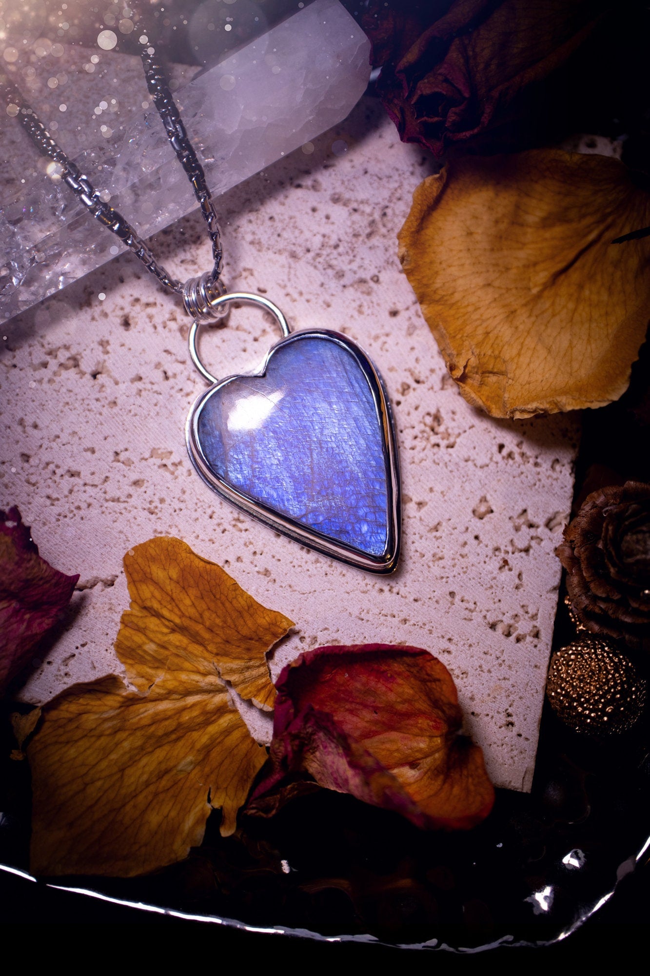 Bold and beautiful, blue flash, belomorite moonstone crystal heart pendant necklace. This pendant has been handcrafted out of fine and sterling silver. The piece is minimal yet unique. Suitable for jewellery gifts. Gothic, hippy and ideal for her.