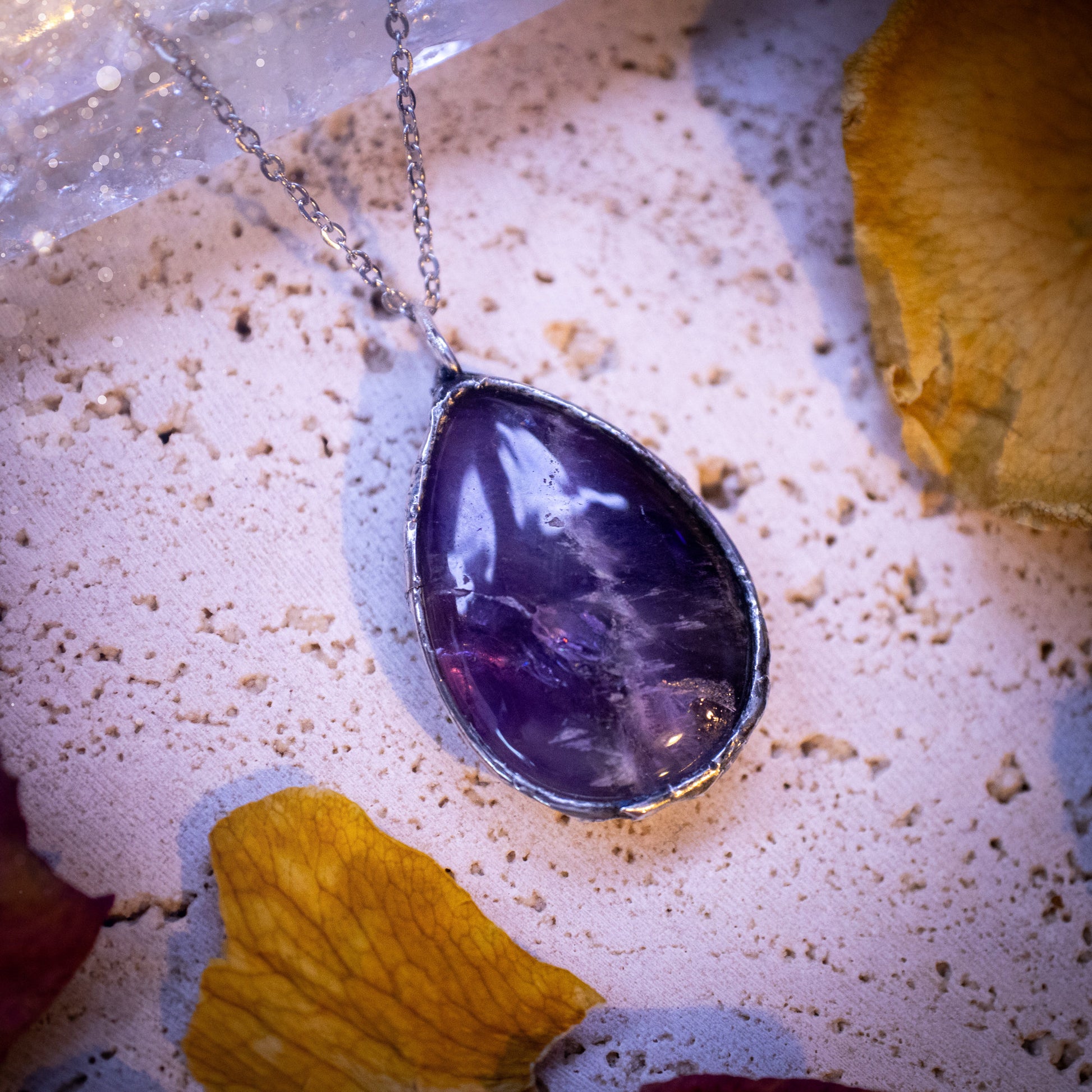 Beautiful, rich purple amethyst, soft soldered pendant necklace. This pendant has been made using the tiffany technique with lead free solder that contains silver. Featuring the most beautiful rainbow crystal. Gothic Jewellery. Crystals, witchy