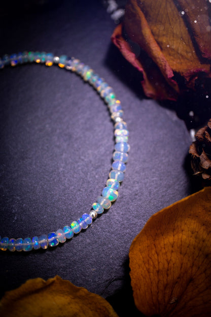 Bold and stunning, Ethiopian Welo Opal stacking Bracelet. This bracelet has been made using the finest opals which are full of beautiful colours and sparkles. Strung on durable yet flexible 49 strand beading wire. Crystal gifts for her.