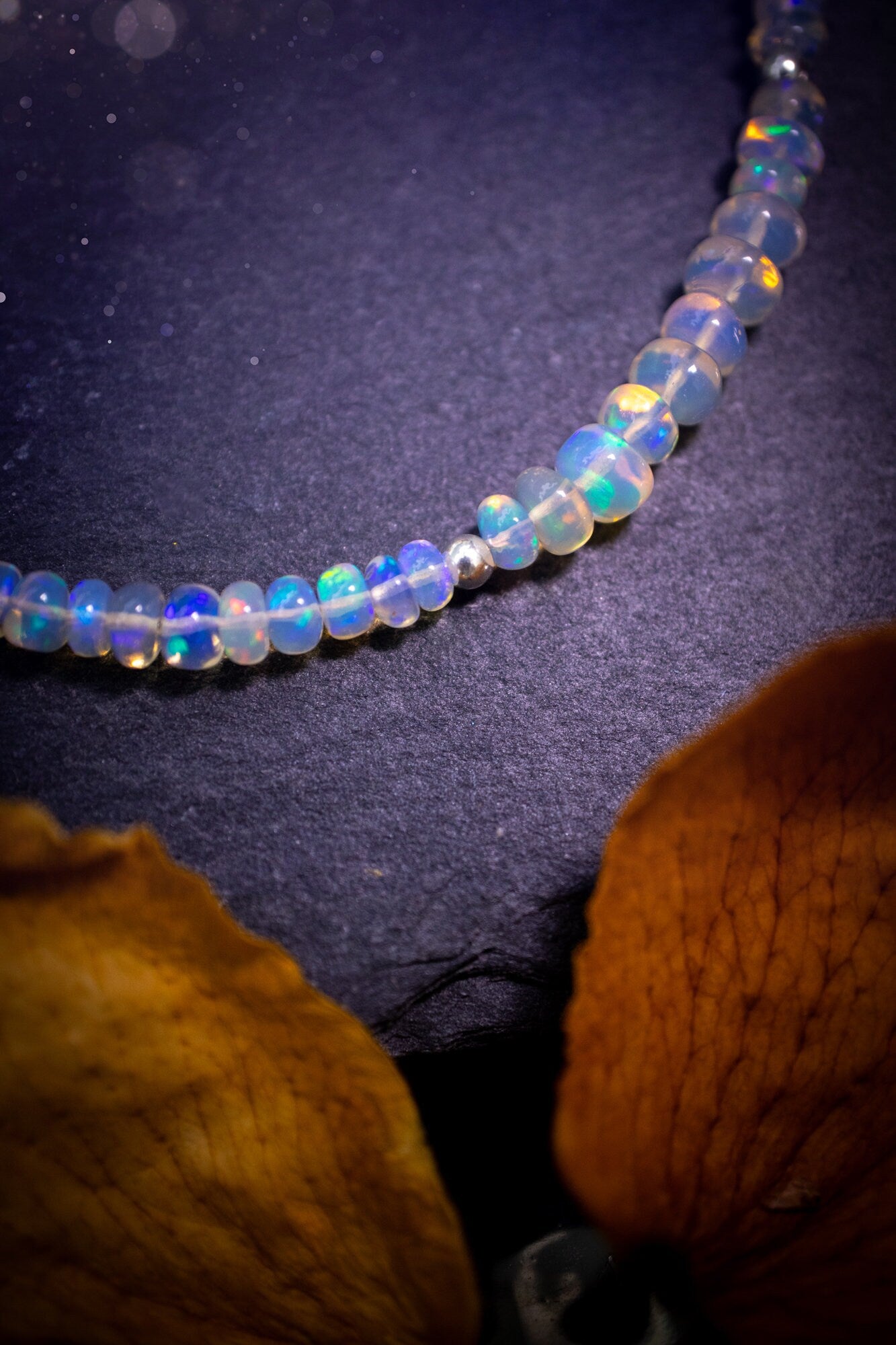 Bold and stunning, Ethiopian Welo Opal stacking Bracelet. This bracelet has been made using the finest opals which are full of beautiful colours and sparkles. Strung on durable yet flexible 49 strand beading wire. Crystal gifts for her.