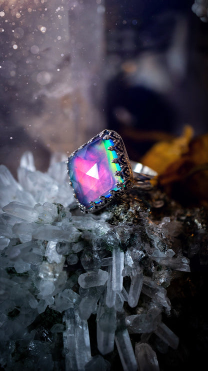 Truly unique and regal, sterling silver, aurora opal stacking ring. This ring has been handmade with a very colourful aurora opal that is full of pinks, greens and blues. Mounted on a plain ring shank, featuring regal gallery bezel around the gem