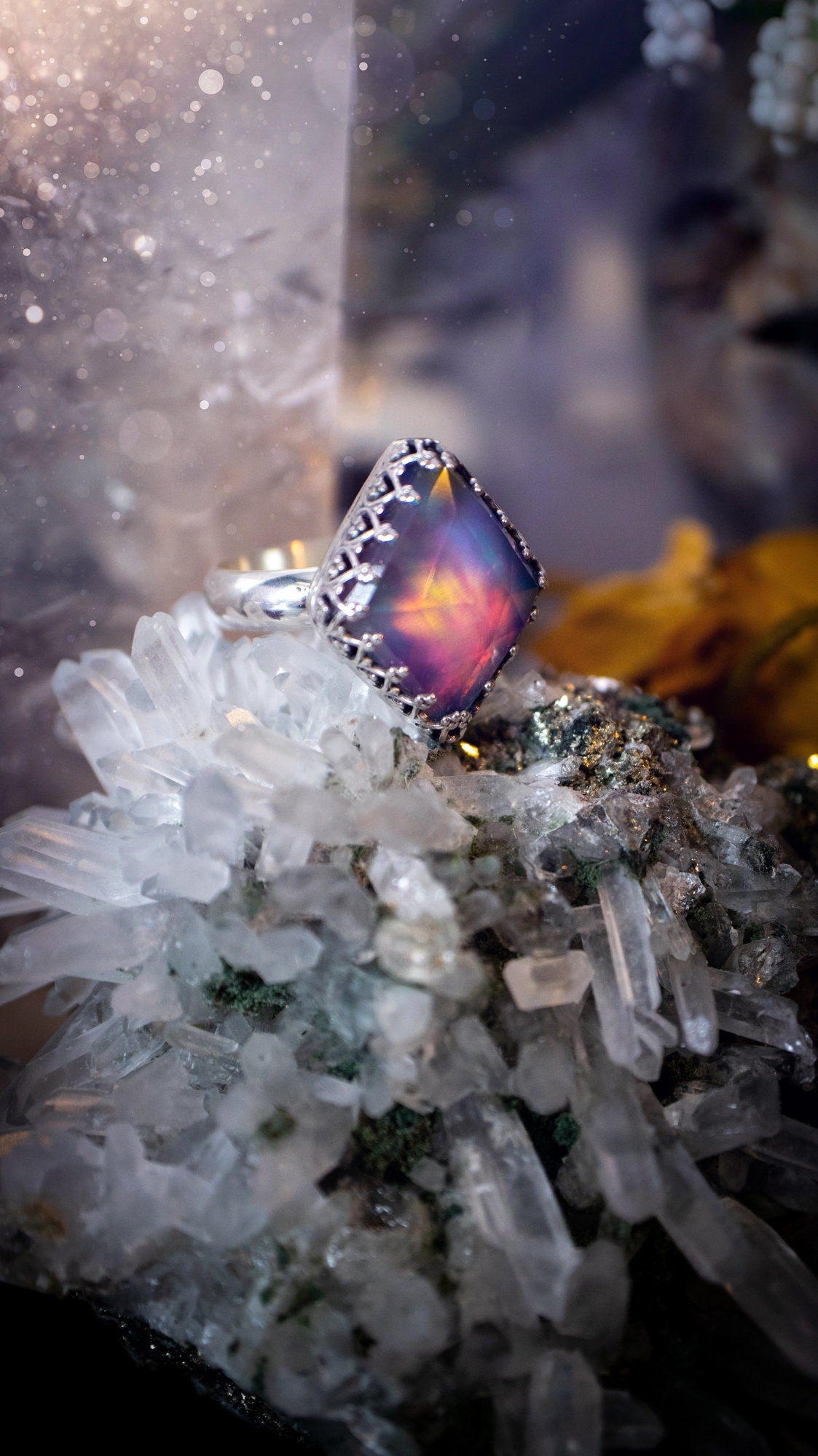 Truly unique and regal, sterling silver, aurora opal stacking ring. This ring has been handmade with a very colourful aurora opal that is full of pinks, greens and blues. Mounted on a plain ring shank, featuring regal gallery bezel around the gem