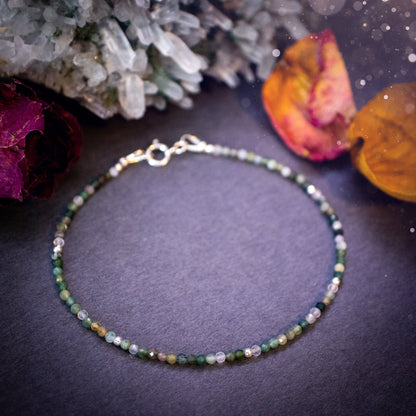 Beautifully handmade, moss agate crystal stacking bracelet. This bracelet has been made using high quality moss agate beads which are facetted to give a gorgeous sparkle. Strung on 49 strand beading wire for durability and a good drape on the wrist.