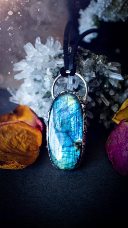 Beautiful, flashy blue labradorite crystal which has been soft soldered to create a stunning pendant. Natural crystal gemstone with lead free solder, a beautiful gift for any crystal lover. This piece of jewellery can be used for healing purposes.