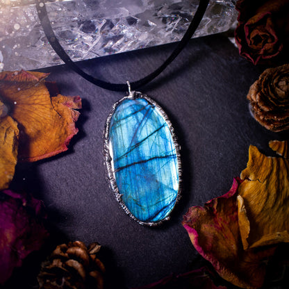 Beautiful, flashy blue labradorite crystal which has been soft soldered to create a stunning pendant. Natural crystal gemstone with lead free solder, a beautiful gift for any crystal lover. This piece of jewellery can be used for healing purposes.