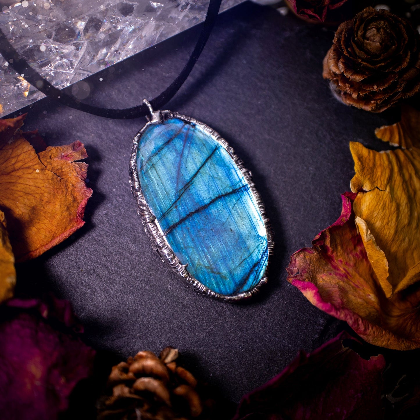 Beautiful, flashy blue labradorite crystal which has been soft soldered to create a stunning pendant. Natural crystal gemstone with lead free solder, a beautiful gift for any crystal lover. This piece of jewellery can be used for healing purposes.