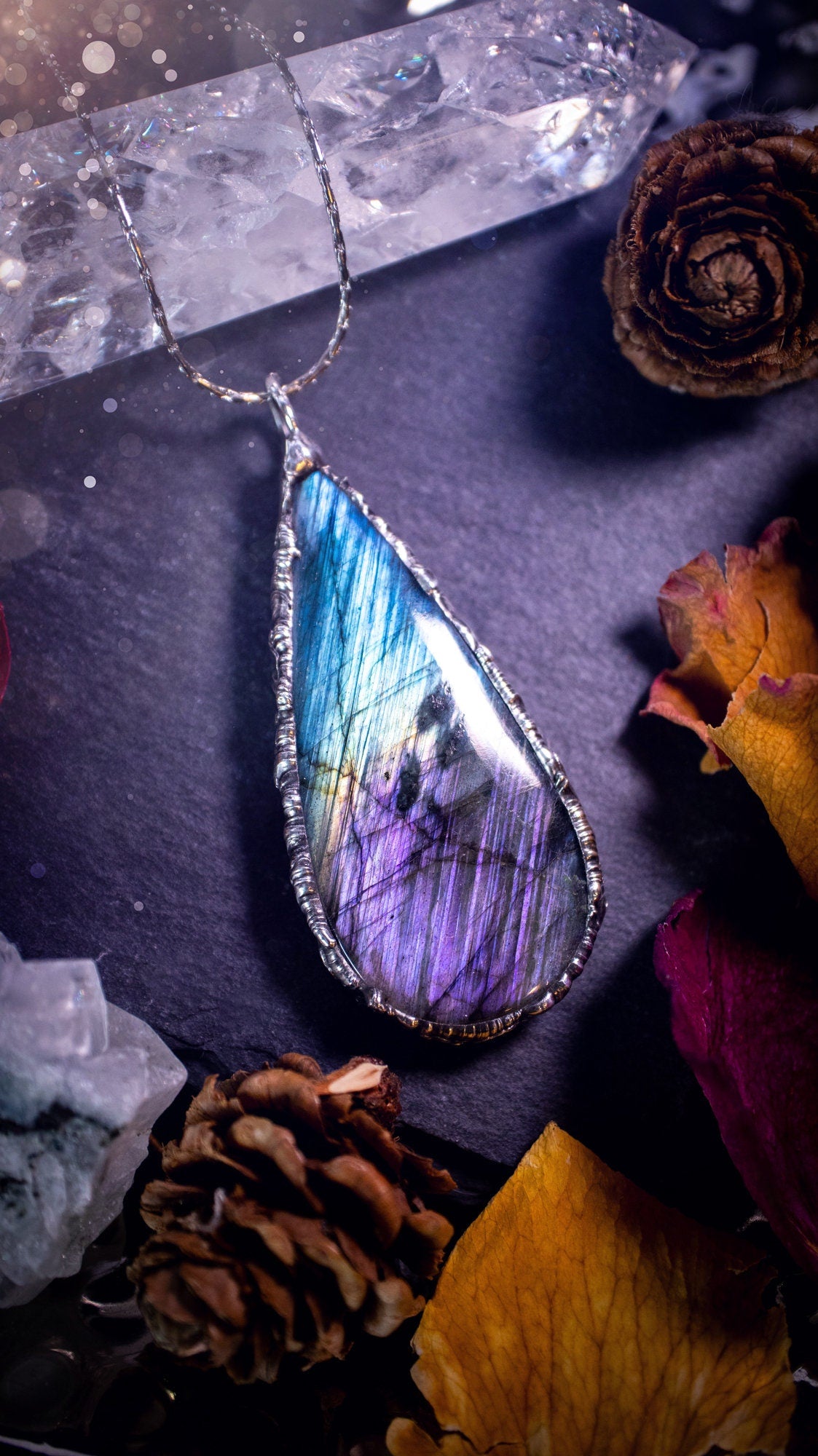 Beautiful, blue and purple labradorite crystal which has been soft soldered to create a stunning pendant. Natural crystal gemstone with lead free solder, a beautiful gift for any crystal lover. This piece of jewellery can be used for healing. Gothic