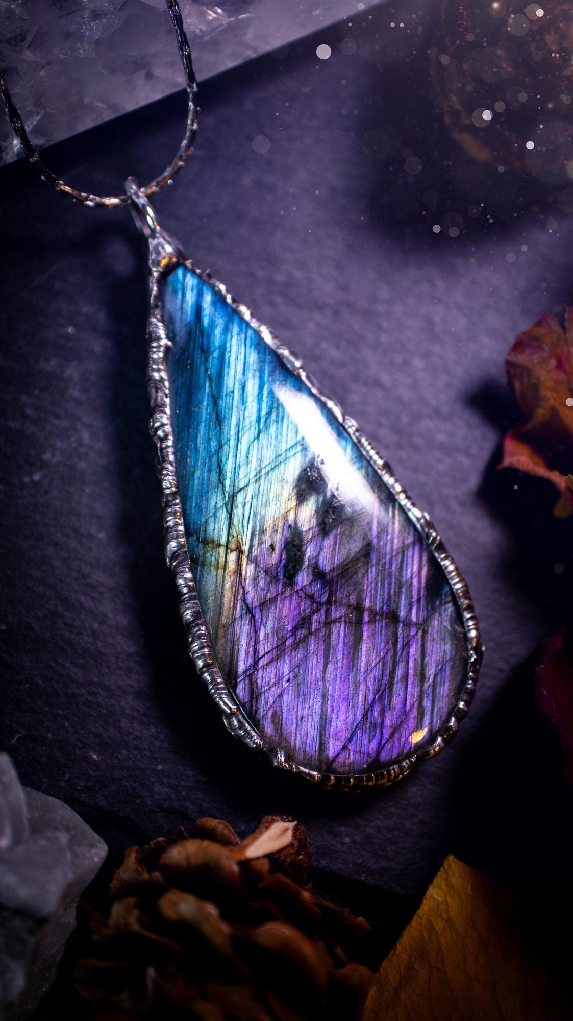 Beautiful, blue and purple labradorite crystal which has been soft soldered to create a stunning pendant. Natural crystal gemstone with lead free solder, a beautiful gift for any crystal lover. This piece of jewellery can be used for healing. Gothic