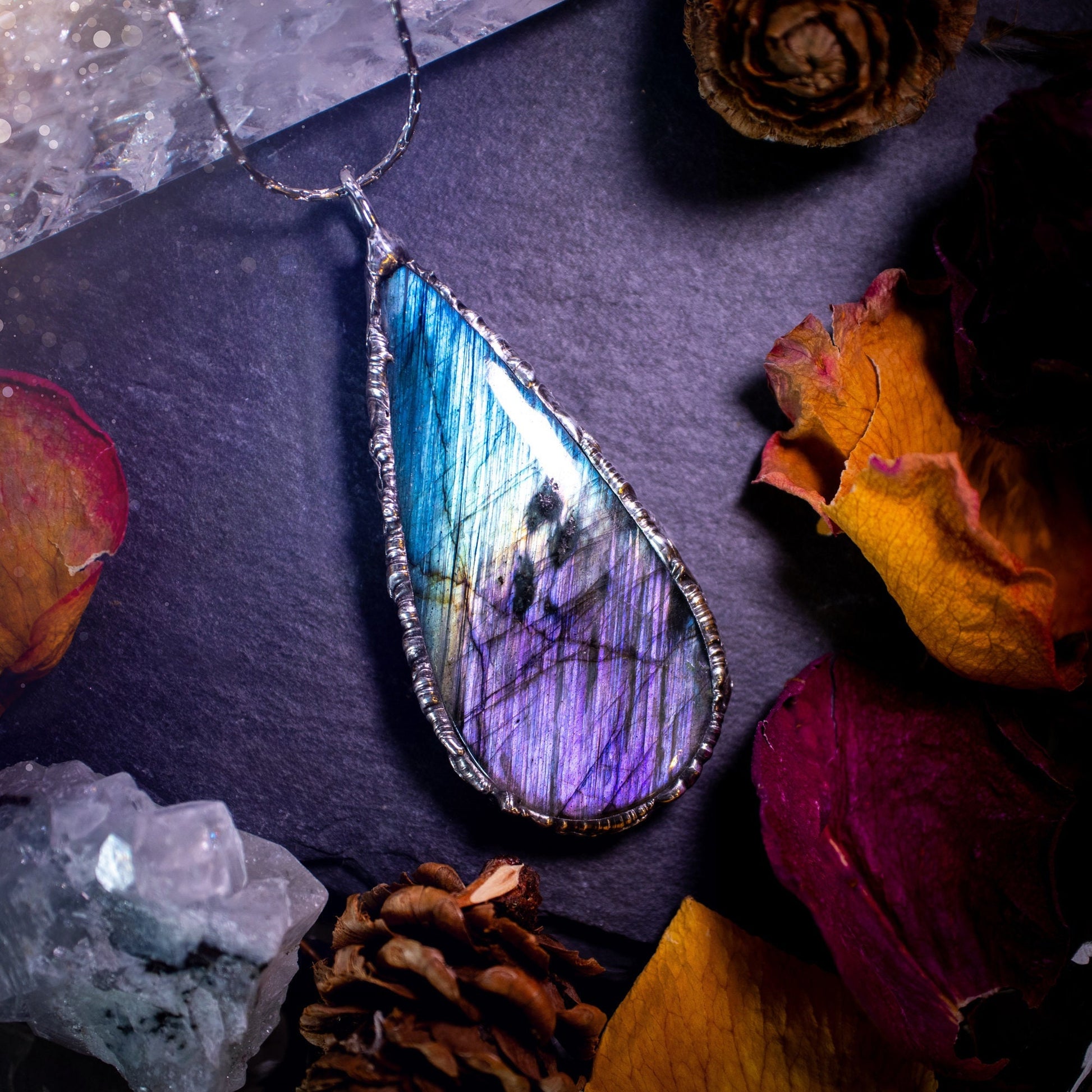 Beautiful, blue and purple labradorite crystal which has been soft soldered to create a stunning pendant. Natural crystal gemstone with lead free solder, a beautiful gift for any crystal lover. This piece of jewellery can be used for healing. Gothic