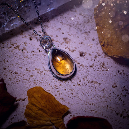 Stunning and minimalistic, natural citrine crystal pendant necklace. This pendant has been handcrafted using recycled sterling silver and has a minimalistic design. Ideal gift for birthdays, as this gemstone is the birthstone for November.