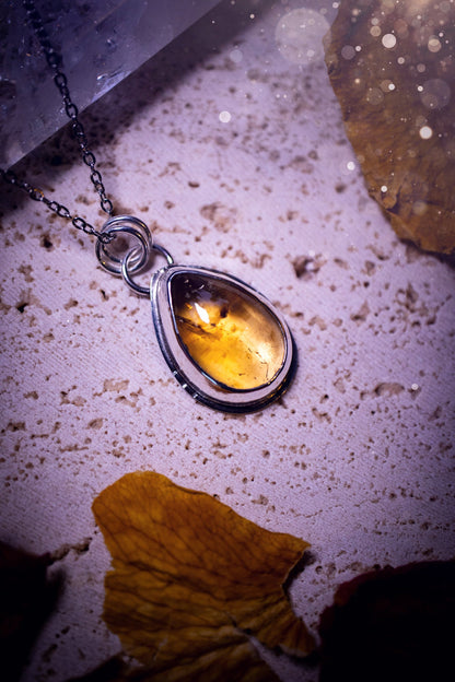 Stunning and minimalistic, natural citrine crystal pendant necklace. This pendant has been handcrafted using recycled sterling silver and has a minimalistic design. Ideal gift for birthdays, as this gemstone is the birthstone for November.