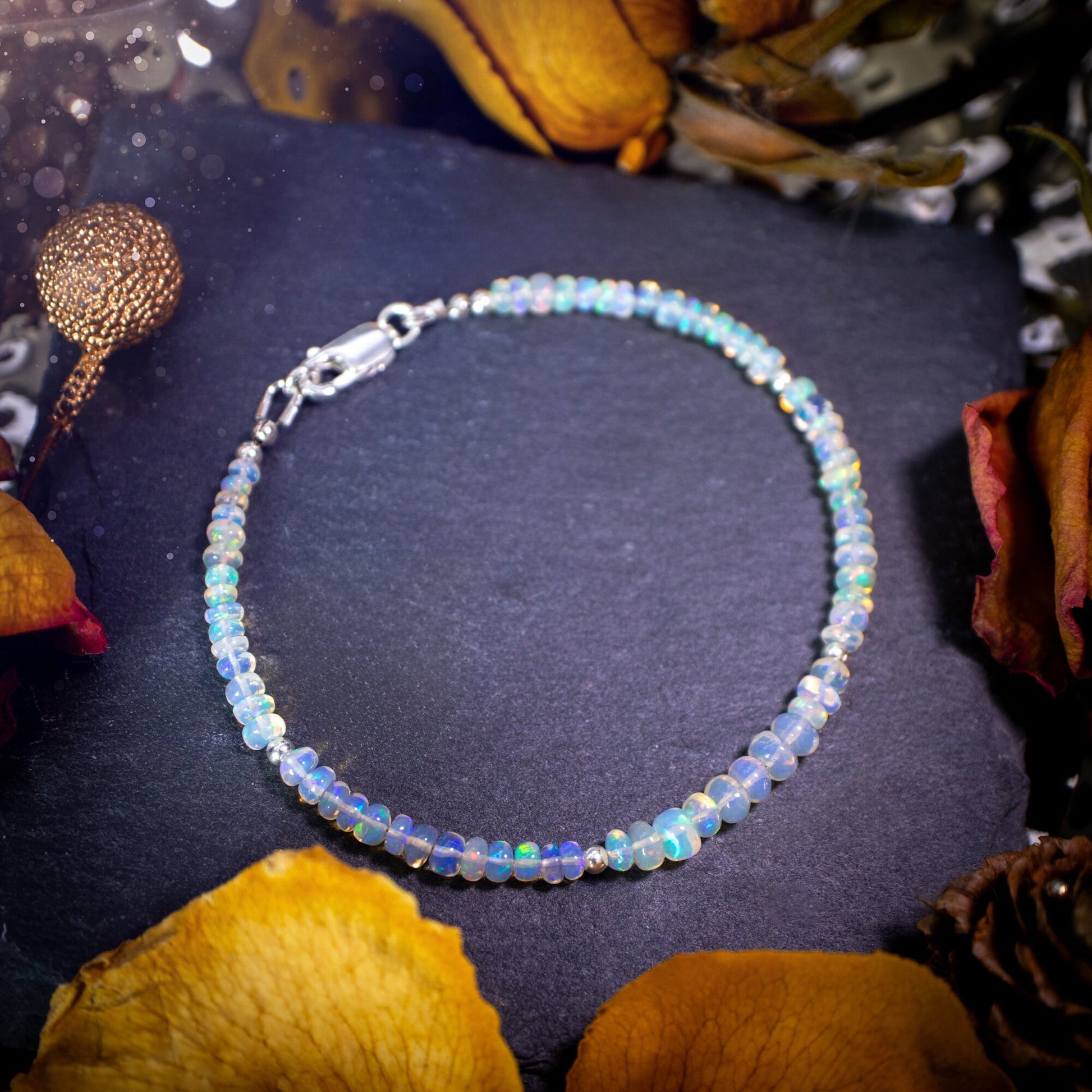 Bold and stunning, Ethiopian Welo Opal stacking Bracelet. This bracelet has been made using the finest opals which are full of beautiful colours and sparkles. Strung on durable yet flexible 49 strand beading wire. Crystal gifts for her.