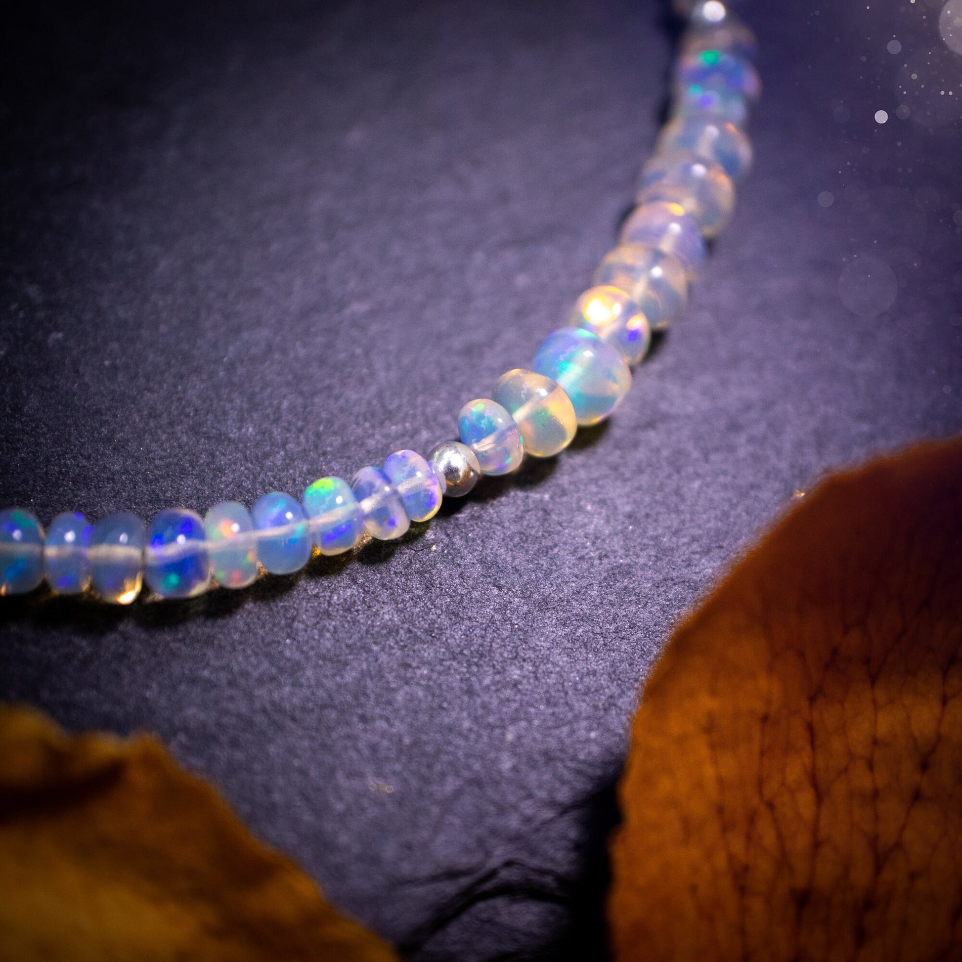 Bold and stunning, Ethiopian Welo Opal stacking Bracelet. This bracelet has been made using the finest opals which are full of beautiful colours and sparkles. Strung on durable yet flexible 49 strand beading wire. Crystal gifts for her.