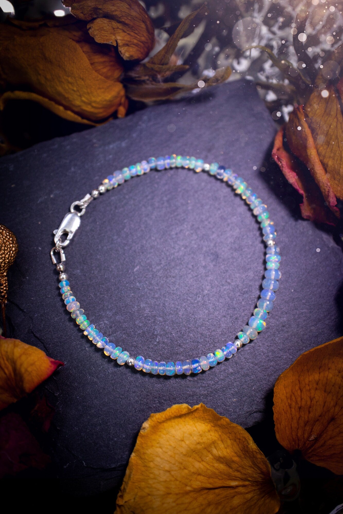 Bold and stunning, Ethiopian Welo Opal stacking Bracelet. This bracelet has been made using the finest opals which are full of beautiful colours and sparkles. Strung on durable yet flexible 49 strand beading wire. Crystal gifts for her.