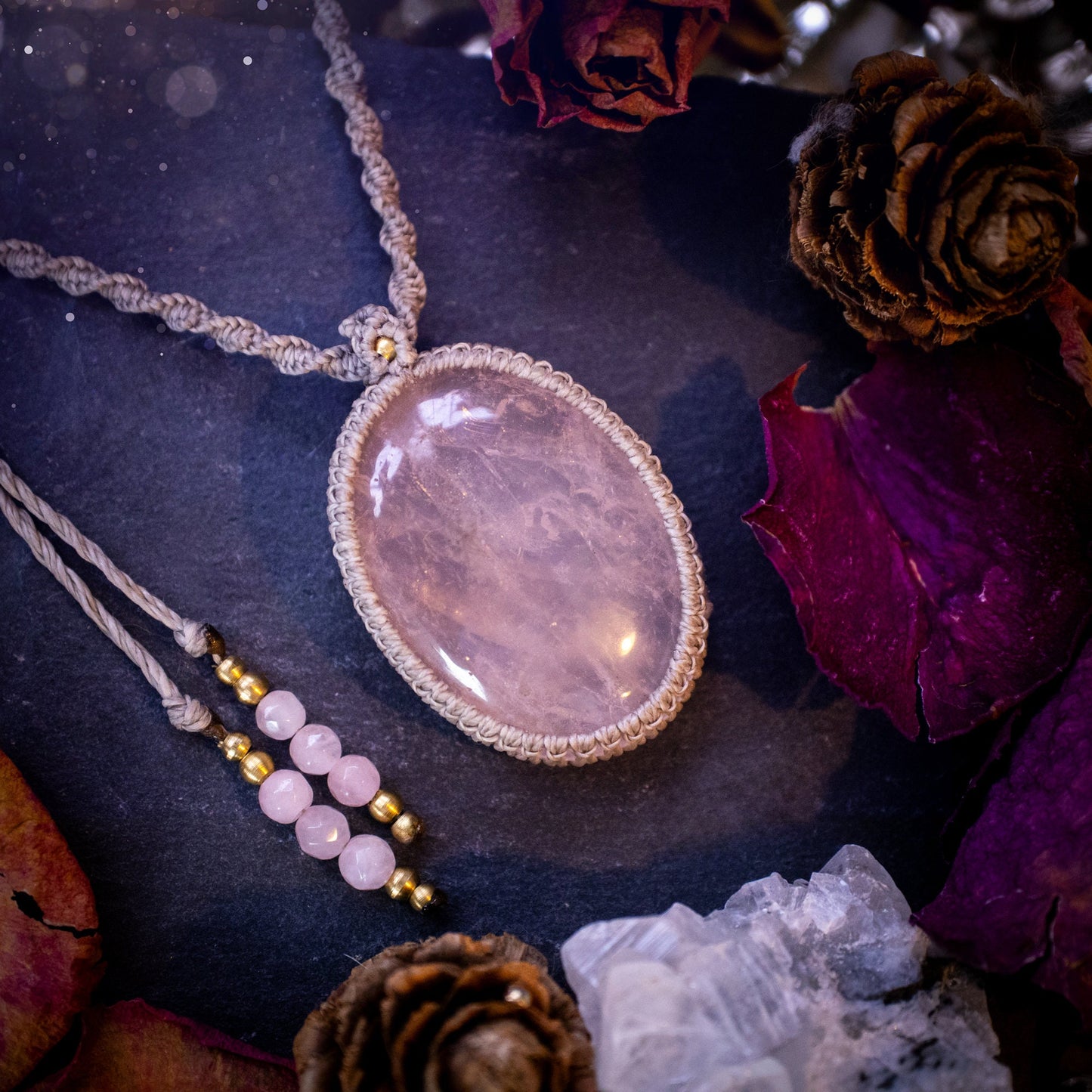 Handmade, natural rose quartz macrame pendant necklace. Featuring a beautiful Rose Quartz crystal which is full of inclusions and a little rainbow. Crafted with high quality linhastia wax cord, and accents on the necklace. Hippy gifts for her.