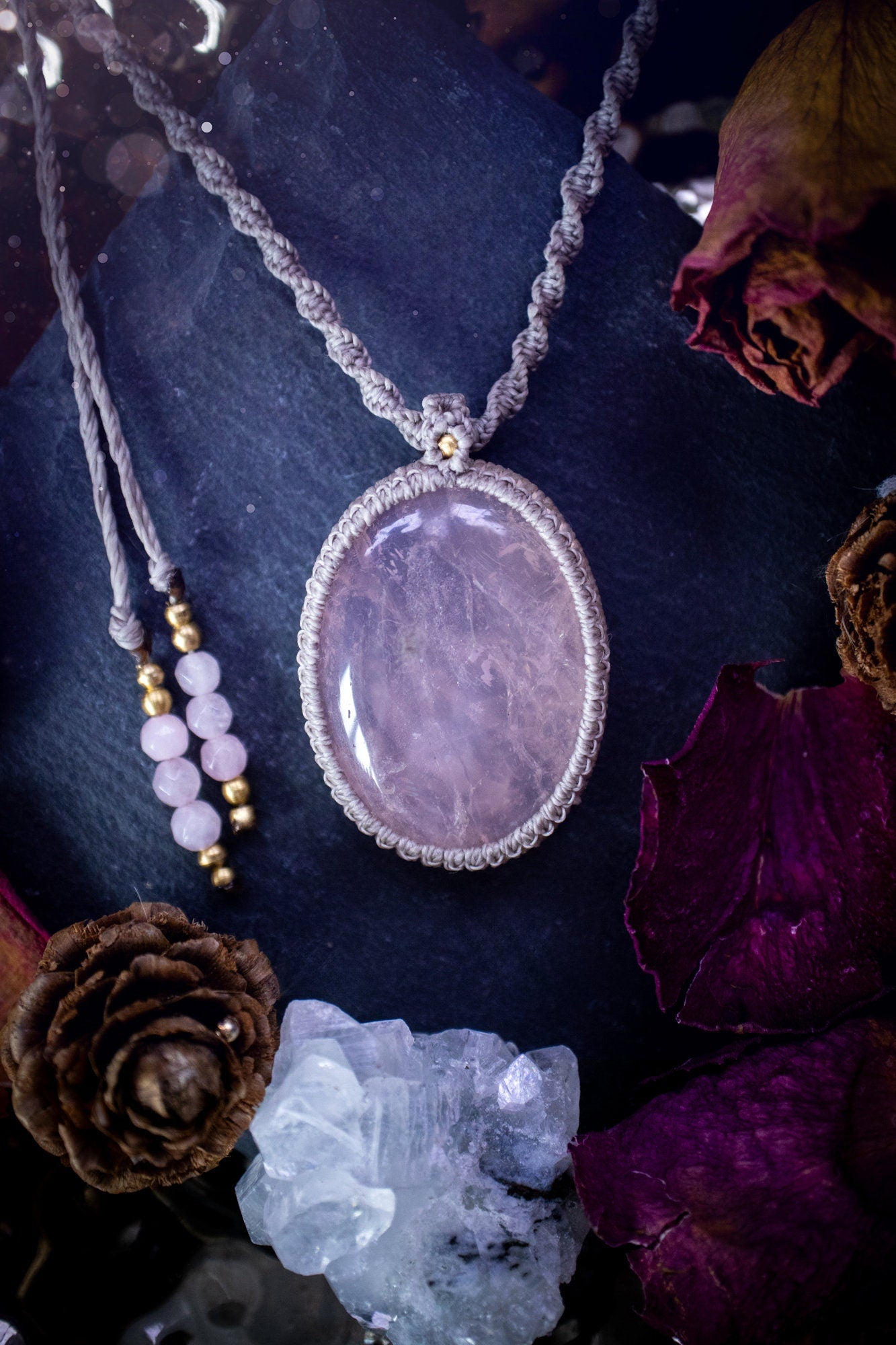 Handmade, natural rose quartz macrame pendant necklace. Featuring a beautiful Rose Quartz crystal which is full of inclusions and a little rainbow. Crafted with high quality linhastia wax cord, and accents on the necklace. Hippy gifts for her.