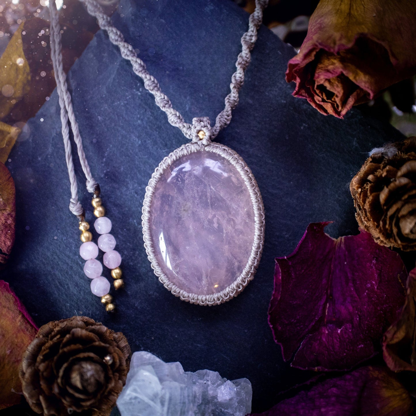 Handmade, natural rose quartz macrame pendant necklace. Featuring a beautiful Rose Quartz crystal which is full of inclusions and a little rainbow. Crafted with high quality linhastia wax cord, and accents on the necklace. Hippy gifts for her.