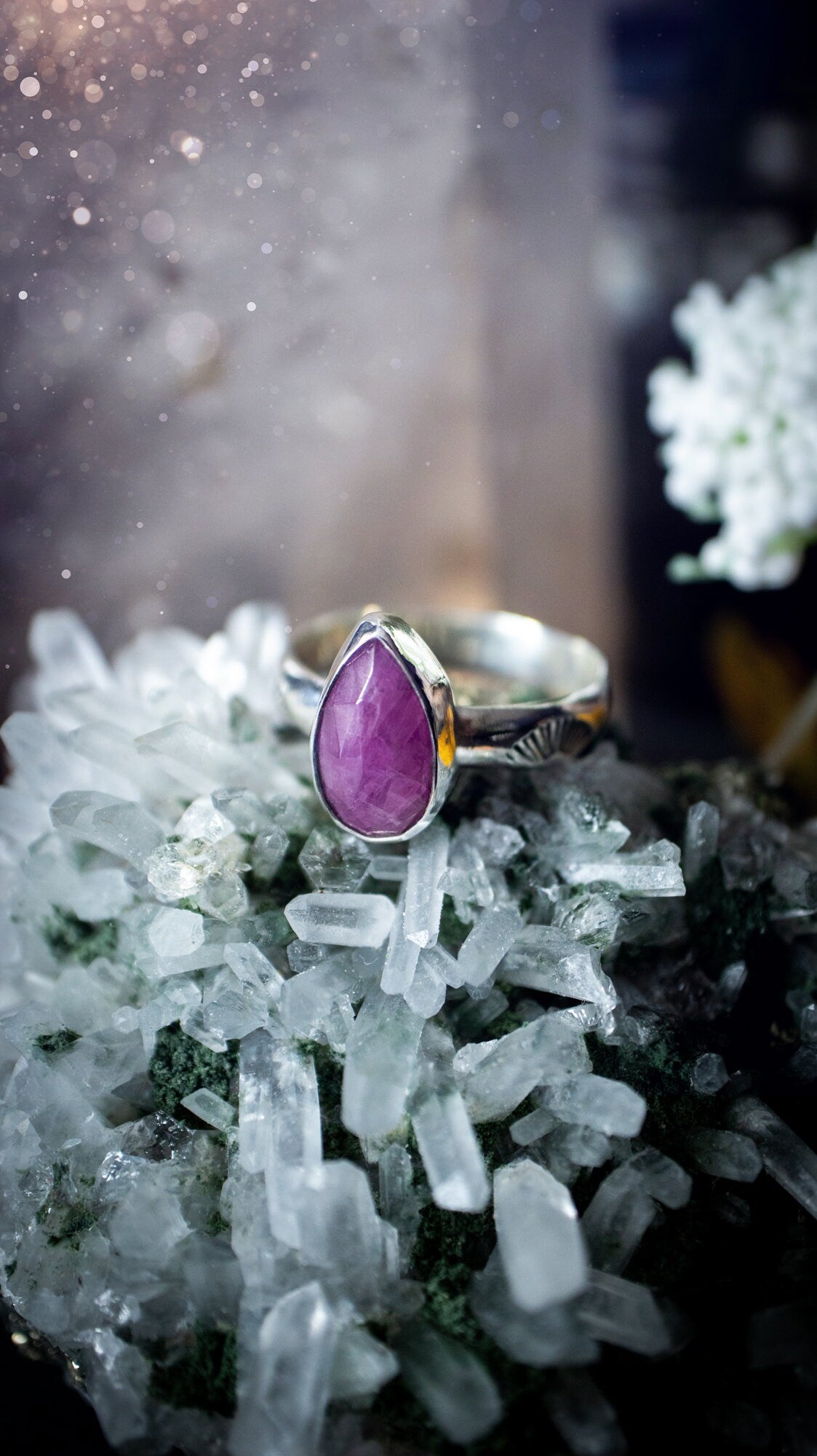 Stunning and handcrafted, natural ruby sterling silver stacking ring. This beautiful ring has been made from recycled sterling silver and has a stamped ring shank. Size s 3/4. The ruby has a lovely glow. Ideal for crystal and jewellery lovers. Hippy.