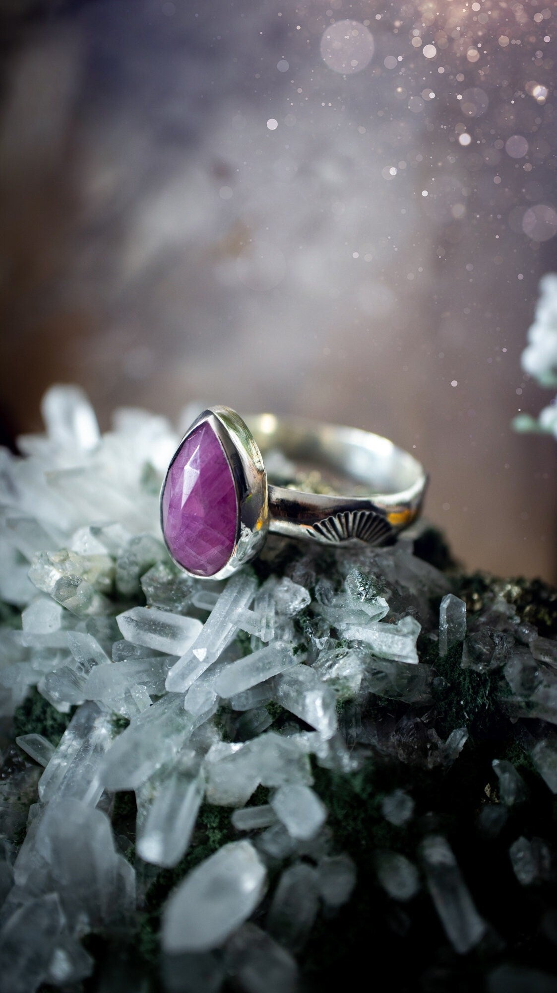 Stunning and handcrafted, natural ruby sterling silver stacking ring. This beautiful ring has been made from recycled sterling silver and has a stamped ring shank. Size s 3/4. The ruby has a lovely glow. Ideal for crystal and jewellery lovers. Hippy.