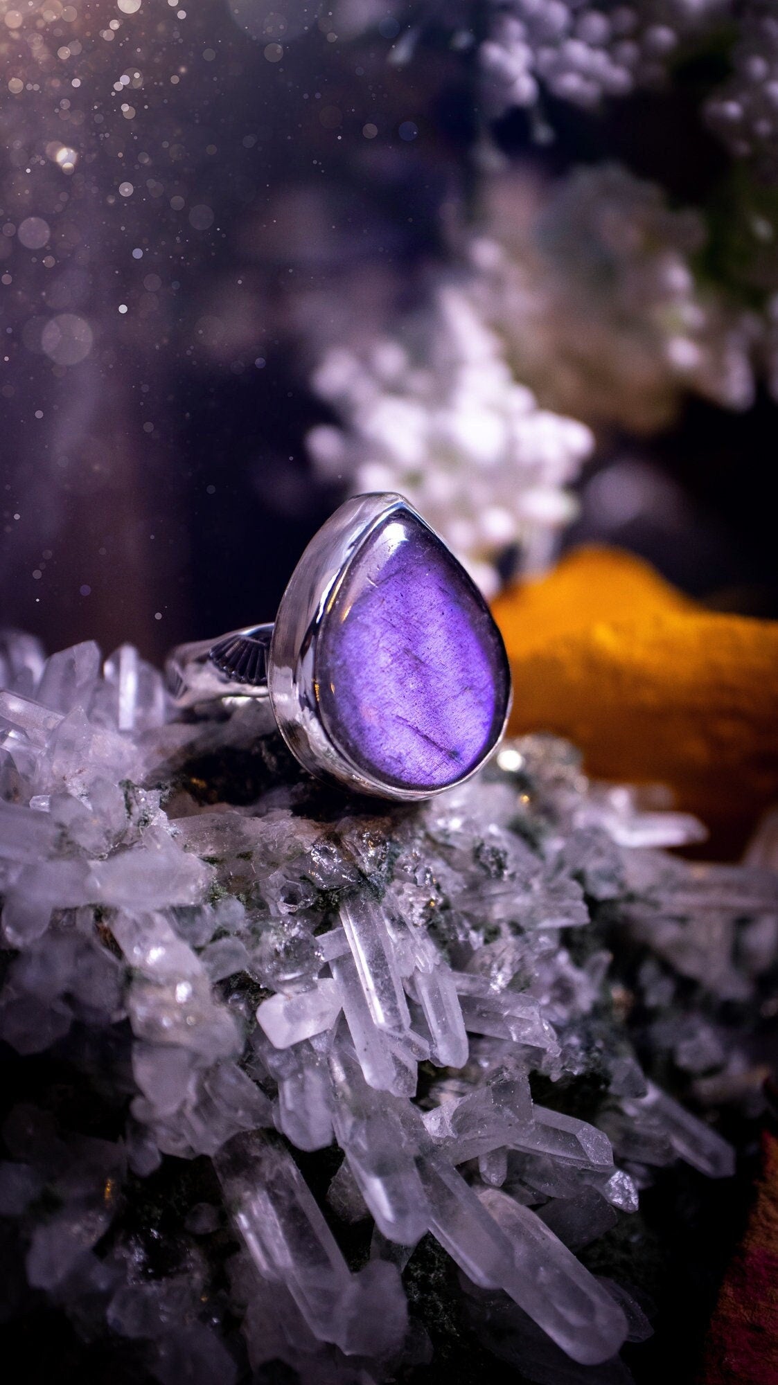 Stunning and handcrafted, natural purple labradorite sterling silver stacking ring. This beautiful ring has been made from recycled sterling silver and has a stamped ring shank. Size N 1/2. Ideal for crystal and jewellery lovers. Hippy and witch.