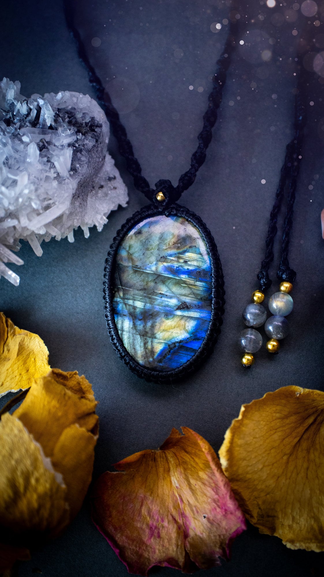 Handmade, blue and green labradorite macrame pendant necklace. Featuring a beautiful labradorite crystal which is full of icy colours and patterns. Crafted with high quality linhastia wax cord, and accents on the necklace. Hippy gifts his and hers.