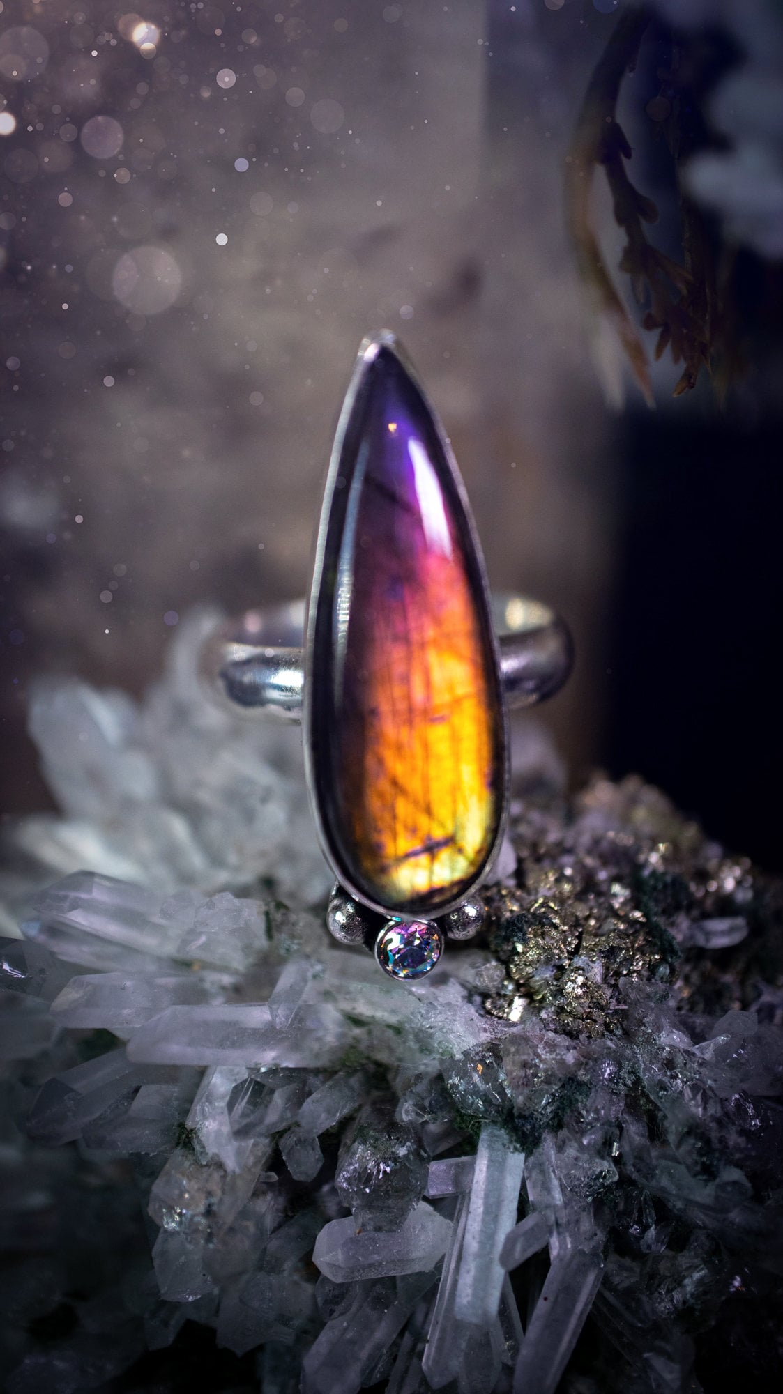 Stunning and handcrafted, natural purple labradorite sterling silver statement ring. This beautiful ring has been made from recycled sterling silver and has a smooth ring shank. Size N. Ideal for crystal and jewellery lovers. Hippy and witch jewelry.