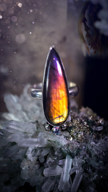 Stunning and handcrafted, natural purple labradorite sterling silver statement ring. This beautiful ring has been made from recycled sterling silver and has a smooth ring shank. Size N. Ideal for crystal and jewellery lovers. Hippy and witch jewelry.