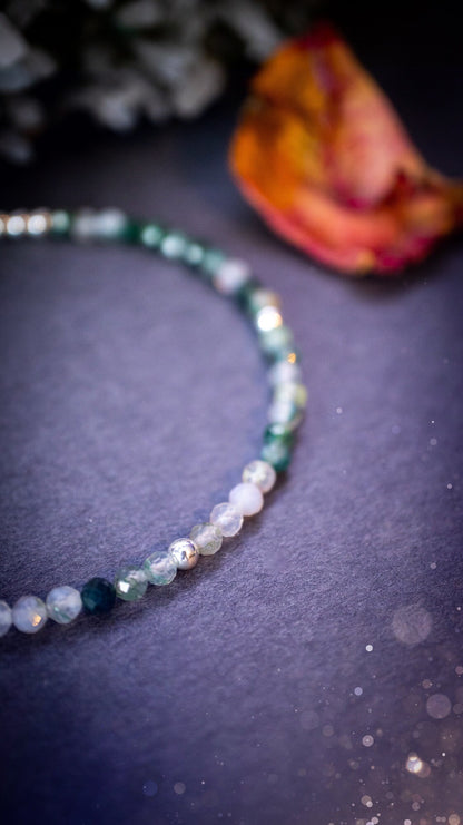 Beautifully handmade, moss agate crystal stacking bracelet. This bracelet has been made using high quality moss agate beads which are facetted to give a gorgeous sparkle. Strung on 49 strand beading wire for durability and a good drape on the wrist.