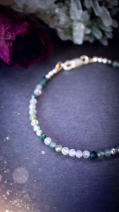 Beautifully handmade, moss agate crystal stacking bracelet. This bracelet has been made using high quality moss agate beads which are facetted to give a gorgeous sparkle. Strung on 49 strand beading wire for durability and a good drape on the wrist.